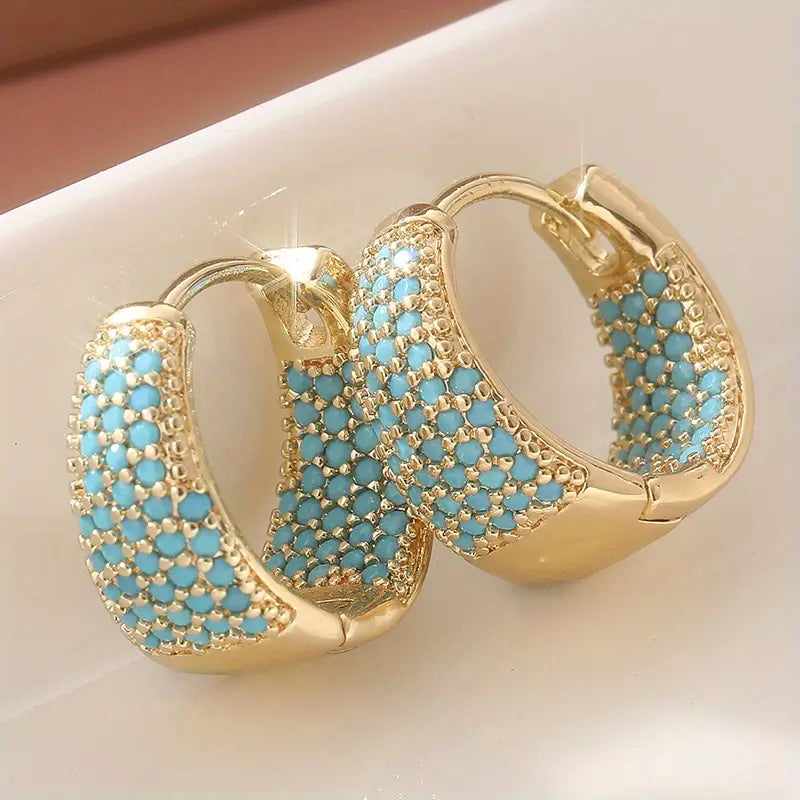 Boucles d’oreilles créoles ornées de perles turquoise ton | Or